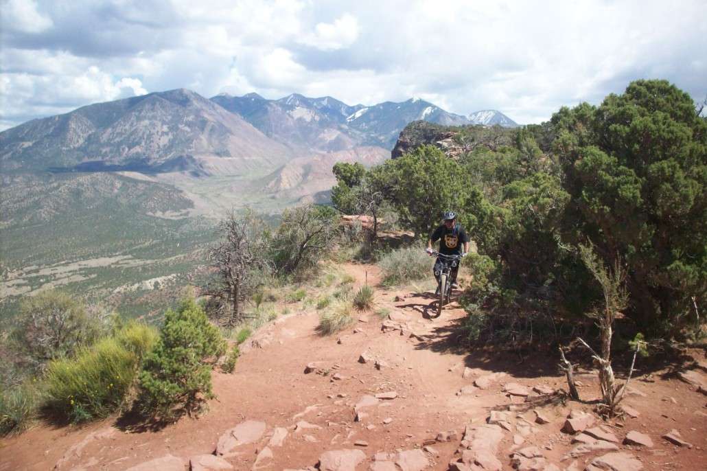 Just past halfway at the famous view point. You start near the top of the La Sals behind you!